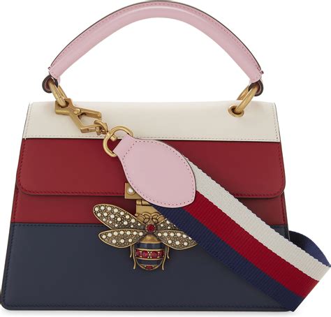 gucci bee black fake|gucci bag red and blue.